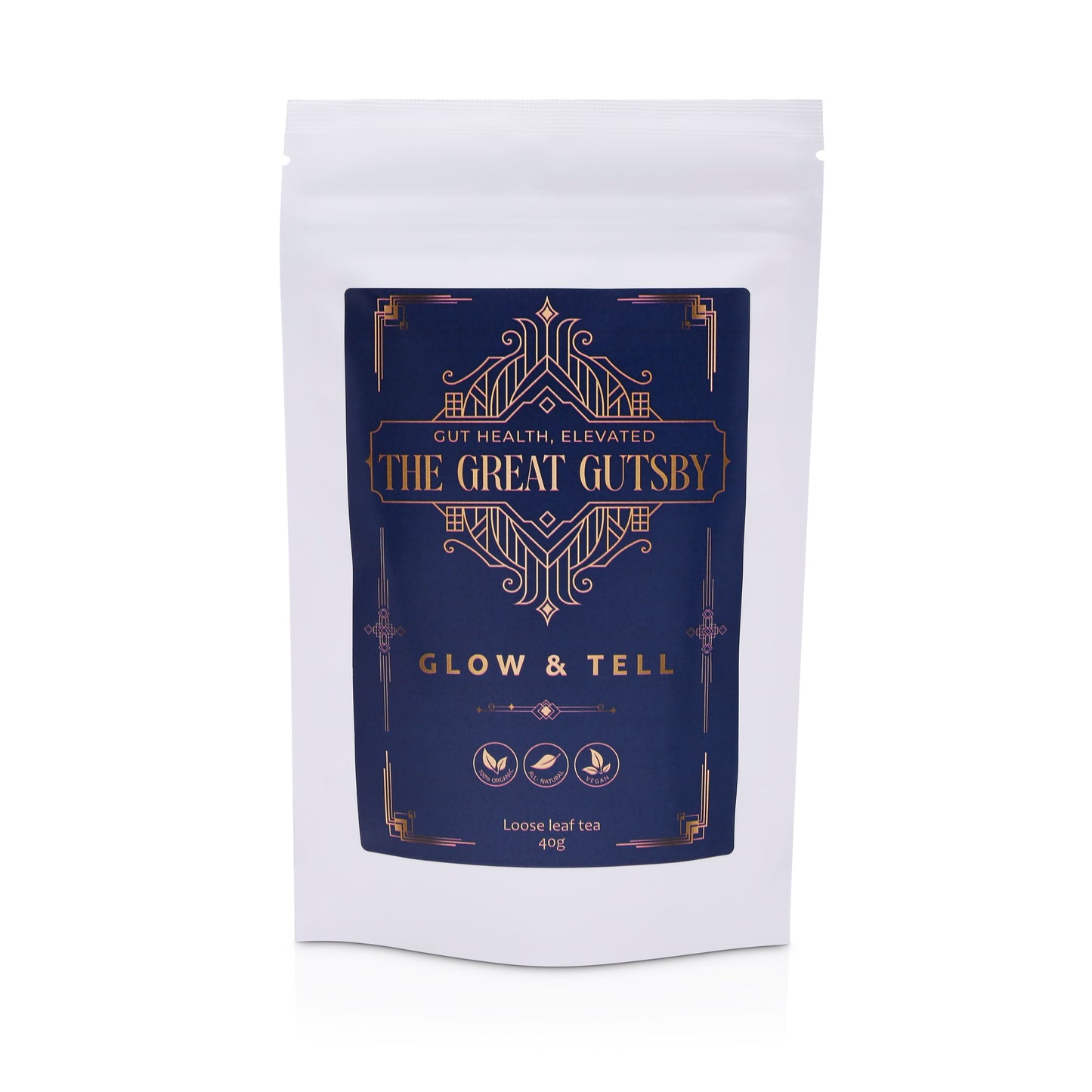 Glow & Tell detox and skin radiance tea blend with herbal ingredients for gut health support, presented in premium Art Deco navy and gold packaging.