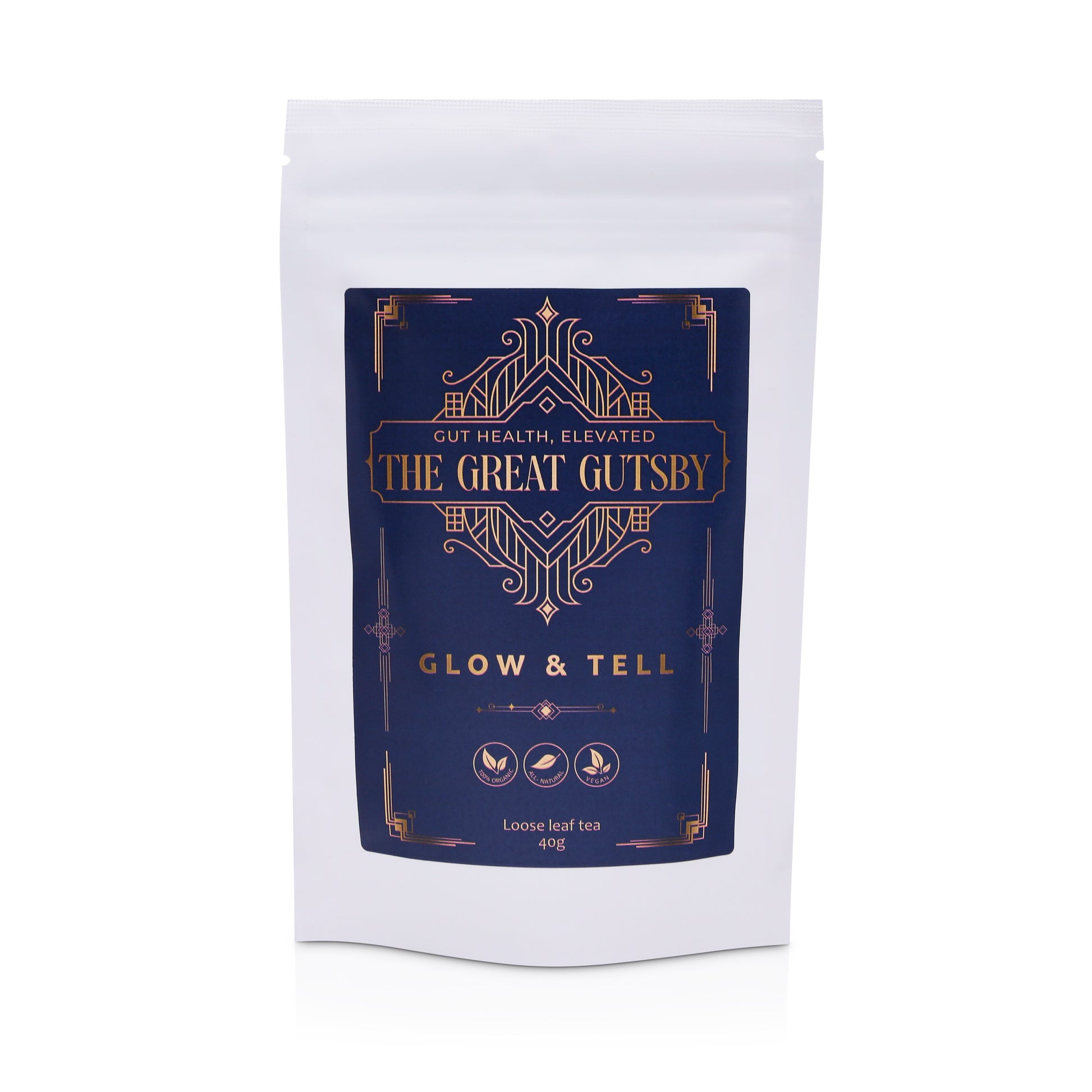Glow & Tell detox and skin radiance tea blend with herbal ingredients for gut health support, presented in premium Art Deco navy and gold packaging.