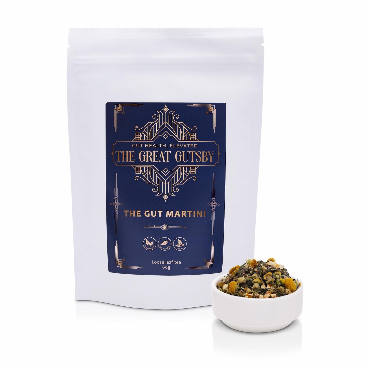 The Gut Martini gut health tea blend for digestion and bloating support, featuring herbal botanicals in luxury Art Deco navy and gold packaging.